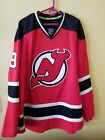 New Jersey Devils Taylor Hall Pro Jersey 9 Reebok Size 56 w fight strap